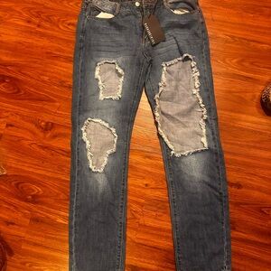 Fashion Nova cut up jeans size 9
